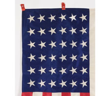 36 STARS, MADE IN 1864 IN NEW YORK CITY, AN EXTRAORDINARY, ENTIRELY HAND-SEWN SILK FLAG WITH SINGLE-APPLIQUED STARS, CIVIL WAR ERA, 1864-67
