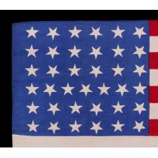 37 STAR ANTIQUE AMERICAN FLAG WITH LINEAL ROWS OF "DANCING" OR "TUMBLING" STARS, NEBRASKA STATEHOOD, 1867-1876, THE ERA OF AMERICAN RECONSTRUCTION