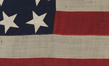 38 CANTED HAND-SEWN STARS AND HAND-SEWN STRIPES ON A FLAG IN A DESIRABLE SMALL SCALE FOR THE PERIOD, 1876-1889, COLORADO STATEHOOD