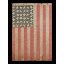 38 LARGE STARS POINTING IN VARIOUS DIRECTIONS ON AN ANTIQUE AMERICAN PARADE FLAG WITH PERSIMMON STRIPES, AN ABSOLUTELY BEAUTIFUL EXAMPLE IN A VARIATION THAT I HAVE NOT BEFORE SEEN, COLORADO STATEHOOD, 1876-1889
