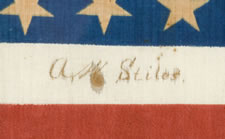 38 STAR ANTIQUE AMERICAN FLAG WITH "1876 CENTENNIAL" ADVERTISING & GOLD STARS, MADE FOR THE CENTENNIAL INTERNATIONAL EXPOSITION IN PHILADELPHIA