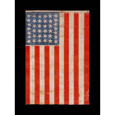 38 STAR ANTIQUE AMERICAN FLAG WITH SCATTERED STAR POSITIONING MADE DURING THE PERIOD WHEN COLORADO WAS THE MOST RECENT STATE TO JOIN THE UNION, 1876-1889