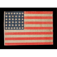38 STAR ANTIQUE AMERICAN PARADE FLAG WITH JUSTIFIED ROWS OF 7-6-6-6-6-7 AND SCATTERED STAR ORIENTATION, MADE DURING THE PERIOD WHEN COLORADO WAS THE MOST RECENT STATE TO JOIN THE UNION, 1876-1889