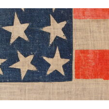 38 STAR ANTIQUE AMERICAN PARADE FLAG WITH JUSTIFIED ROWS OF 7-6-6-6-6-7 AND SCATTERED STAR ORIENTATION, MADE DURING THE PERIOD WHEN COLORADO WAS THE MOST RECENT STATE TO JOIN THE UNION, 1876-1889