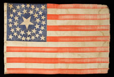 38 STARS, 1876-1889, COLORADO STATEHOOD, A LARGE PARADE WITH A DOUBLE-WREATH PATTERN AND A HUGE CENTER STAR