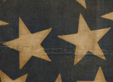 38 STARS, 1876-1889, COLORADO STATEHOOD, A LARGE PARADE FLAG WITH A DOUBLE-WREATH PATTERN AND A HUGE CENTER STAR