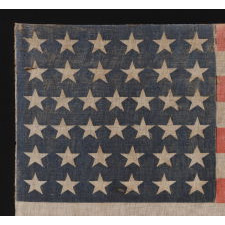 38 STARS ON AN ANTIQUE AMERICAN FLAG, MADE DURING THE PERIOD WHEN COLORADO WAS THE MOST RECENT STATE ADDED TO THE UNION, 1876-1889