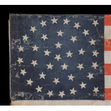 38 STARS IN A BEAUTIFUL MEDALLION CONFIGURATION WITH 2 OUTLIERS, ON A LARGE SCALE ANTIQUE AMERICAN PARADE FLAG OF THE 1876-1889 ERA, COLORADO STATEHOOD