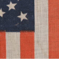 38 STARS IN A BEAUTIFUL MEDALLION CONFIGURATION WITH 2 OUTLIERS, ON AN ANTIQUE AMERICAN FLAG OF THE 1876-1889 ERA, COLORADO STATEHOOD