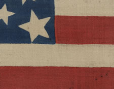 38 STARS, COLORADO STATEHOOD, A RARE MEDALLION PATTERN FLAG WITH 4 LARGE CORNER STARS, MADE FOR THE 1876 CENTENNIAL OF OUR NATION'S INDEPENDENCE, PRESS-DYED ON WOOL BUNTING