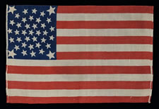 38 STARS, COLORADO STATEHOOD, A RARE, MEDALLION PATTERN FLAG WITH 4 HUGE CORNER STARS, MADE FOR THE 1876 CENTENNIAL OF OUR NATION'S INDEPENDENCE, PRESS-DYED ON WOOL BUNTING