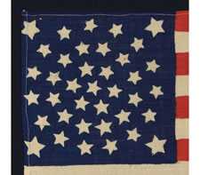 38 STARS, COLORADO STATEHOOD, A VERY RARE MEDALLION PATTERN FLAG WITH 4 LARGE CORNER STARS, MADE FOR THE 1876 CENTENNIAL