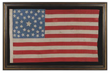 38 STARS ON A CORNFLOWER BLUE CANTON, IN A MEDALLION CONFIGURATION, WITH A RARE GROUPING OF 3 STARS IN EACH CORNER, 1876-1889, COLORADO STATEHOOD