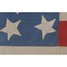 38 STARS ON A CORNFLOWER BLUE CANTON, IN A MEDALLION CONFIGURATION, WITH A RARE GROUPING OF 3 STARS IN EACH CORNER, 1876-1889, COLORADO STATEHOOD