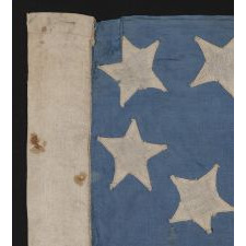38 STARS ON A CORNFLOWER BLUE CANTON, IN A MEDALLION CONFIGURATION, WITH A RARE GROUPING OF 3 STARS IN EACH CORNER, 1876-1889, COLORADO STATEHOOD