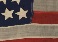 38 STARS IN DANCING ROWS ON A FLAG IN AN ESPECIALLY DESIRABLE SMALL SIZE FOR THE PERIOD, 1876-1889, COLORADO STATEHOOD