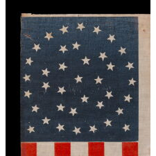 38 STARS IN AN EXCEPTIONALLY RARE “GREAT-STAR-IN-A-WREATH” CONFIGURATION, 1876-1889, REFLECTS THE ADMISSION OF COLORADO AS THE CENTENNIAL STATE