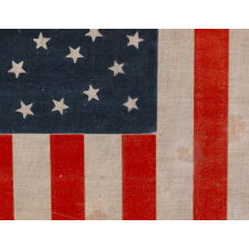38 STARS IN AN EXCEPTIONALLY RARE “GREAT-STAR-IN-A-WREATH” CONFIGURATION, 1876-1889, REFLECTS THE ADMISSION OF COLORADO AS THE CENTENNIAL STATE