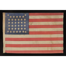38 STARS IN AN EXTREMELY RARE "BEEHIVE" CONFIGURATION ON AN ANTIQUE AMERICAN PARADE FLAG OF THE 1876-1889 PERIOD, COLORADO STATEHOOD, AN EXTRAORDINARY EXAMPLE