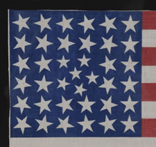 38 STARS IN AN EXTREMELY RARE PATTERN THAT BEARS A CLUSTER OF 6 SMALL STARS WITHIN A LINEAL PATTERN OF LARGER STARS, 1876-1889, COLORADO STATEHOOD