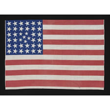 38 STARS IN AN EXTREMELY RARE PATTERN THAT BEARS A CLUSTER OF 6 SMALL STARS WITHIN A LINEAL PATTERN OF LARGER STARS, 1876-1889, COLORADO STATEHOOD