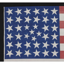 38 STARS IN AN EXTREMELY RARE PATTERN THAT BEARS A CLUSTER OF 6 SMALL STARS WITHIN A LINEAL PATTERN OF LARGER STARS, 1876-1889, COLORADO STATEHOOD