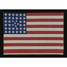 38 STARS IN AN EXTREMELY RARE PATTERN THAT BEARS A CLUSTER OF 6 SMALL STARS WITHIN A LINEAL PATTERN OF LARGER STARS, 1876-1889, COLORADO STATEHOOD