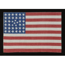 38 STARS IN AN EXTREMELY RARE PATTERN THAT BEARS A CLUSTER OF 6 SMALL STARS WITHIN A LINEAL PATTERN OF LARGER STARS, 1876-1889, COLORADO STATEHOOD:
