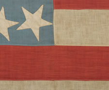 38 STARS IN AN INTERTWINED "DOUBLE-S" CONFIGURATION, ON A CORNFLOWER BLUE CANTON THAT RESTS UPON THE WAR STRIPE, 1876-1889, COLORADO STATEHOOD