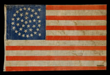38 STARS, MEDALLION CONFIGURATION WITH 2 OUTLIERS ON A CHROMATIC BLUE CANTON, COLORADO STATEHOOD, 1876-1889