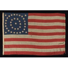 38 STARS IN A MEDALLION CONFIGURATION ON A BEAUTIFUL SCALE FLAG WITH PIECED-AND-SEWN CONSTRUCTION, 1876-1889, COLORADO STATEHOOD