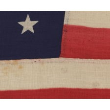 38 STARS IN A NOTCHED, CROSSHATCH PATTERN ON AN ANTIQUE AMERICAN FLAG MADE BY THE U.S. BUNTING COMPANY IN LOWELL, MASSACHUSETTS, 1876-1889, COLORADO STATEHOOD; EX-WHITNEY SMITH COLLECTION (THE MAN WHO COINED THE TERM VEXILLOLOGY)