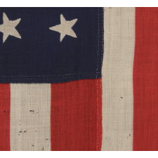 38 STARS IN A "NOTCHED" PATTERN ON A CLAMP-DYED AMERICAN FLAG OF THE 1876-1889 PERIOD, REFLECTS COLORADO STATEHOOD, MADE BY THE U.S. BUNTING COMPANY IN LOWELL, MASSACHUSETTS​