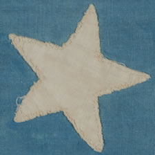 38 STARS POINTING IN VARIOUS DIRECTIONS ON A BRILLIANT, CORNFLOWER BLUE CANTON, COLORADO STATEHOOD, 1876-1889