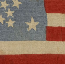 38 STARS IN A RARE GREAT STAR PATTERN, A SILK PARADE FLAG WITH GOLD SILK FRINGE, COLORADO STATEHOOD, 1876-1889