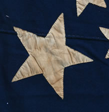 38 STARS IN A RARE OVAL MEDALLION WITH A LARGE CENTER STAR AND FLANKING CORNER STARS, MADE DURING THE PERIOD OF COLORADO STATEHOOD (1876-1889), ATTRIBUTED TO FECHHEIMER BROS. OF CINCINNATI, OHIO