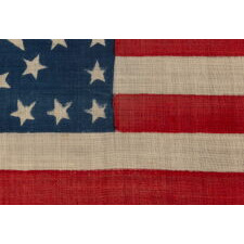 38 STARS IN A RARE AND STRIKING CIRCLE-IN-A-SQUARE MEDALLION, WITH AN ENORMOUS CENTER STAR, MADE FOR THE 1876 CENTENNIAL CELEBRATION BY HORSTMANN BROTHERS OF PHILADELPHIA, A MAJOR MILITARY OUTFITTER