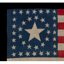 38 STARS IN A RARE AND STRIKING CIRCLE-IN-A-SQUARE MEDALLION, WITH AN ENORMOUS CENTER STAR, MADE FOR THE 1876 CENTENNIAL CELEBRATION BY HORSTMANN BROTHERS OF PHILADELPHIA, A MAJOR MILITARY OUTFITTER