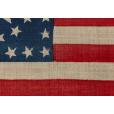 38 STARS IN A RARE AND STRIKING CIRCLE-IN-A-SQUARE MEDALLION, WITH AN ENORMOUS CENTER STAR, MADE FOR THE 1876 CENTENNIAL CELEBRATION BY HORSTMANN BROTHERS OF PHILADELPHIA, A MAJOR MILITARY OUTFITTER