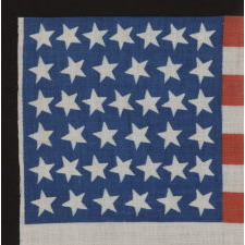 39 CANTED STARS ON A TALL AND NARROW, ROYAL BLUE CANTON, AN 1876 VARIETY REPRESENTING THE ANTICIPATION OF THE ADDITION OF THE DAKOTA AND COLORADO TERRITORIES, NEVER ACCURATE OR OFFICIAL