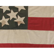 41 STARS IN A LINEAL PATTERN WITH OFFSET STARS THAT CREATE A CROSSHATCH IN THE CORNERS AND CENTER, ONE OF THE RAREST STAR COUNTS AMONG SURVIVING FLAGS OF THE 19TH CENTURY, REFLECTS MONTANA STATEHOOD IN NOVEMBER, 1889, ACCURATE FOR JUST 3 DAYS; EXHIBITED AT THE MUSEUM OF THE AMERICAN REVOLUTION FROM JUNE – SEPTEMBER, 2021