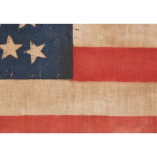 42 STAR ANTIQUE AMERICAN PARADE FLAG WITH AN EXTRAORDINARILY RARE BEEHIVE CONFIGURATION, NEVER AN OFFICIAL STAR COUNT, WASHINGTON STATEHOOD, 1889-1890