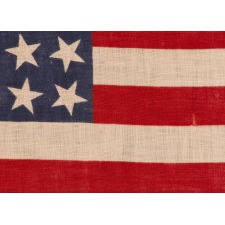 42 STARS ON AN ANTIQUE AMERICAN FLAG WITH SCATTERED STAR POSITIONING, REFLECTS THE ADDITION OF WASHINGTON STATE, MONTANA, AND THE DAKOTAS, NEVER AN OFFICIAL STAR COUNT, circa 1889-1890