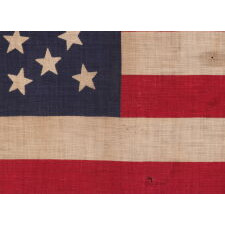 44 STAR ANTIQUE AMERICAN PARADE FLAG WITH A TRIPLE WREATH FORM OF THE MEDALLION CONFIGURATION, RARE IN THIS PERIOD WITH A CIRCULAR STAR ARRANGEMENT, 1890-1896, REFLECTS THE ADDITION OF WYOMING TO THE UNION