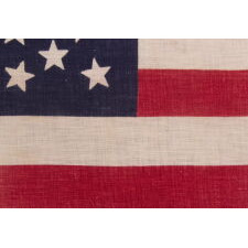 44 STAR ANTIQUE AMERICAN PARADE FLAG WITH A TRIPLE WREATH FORM OF THE MEDALLION CONFIGURATION, RARE IN THIS PERIOD WITH A CIRCULAR STAR ARRANGEMENT, 1890-1896, REFLECTS THE ADDITION OF WYOMING TO THE UNION