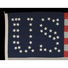 44 STARS CONFIGURED INTO THE LETTERS “U.S.”, PATENTED IN 1890 BY W.R. WASHBURN, ONE OF ONLY FOUR KNOWN SURVIVING EXAMPLES & ONE OF THE VERY BEST DESIGNS KNOWN TO EXIST ACROSS EARLY AMERICAN FLAGS OF ALL PERIODS