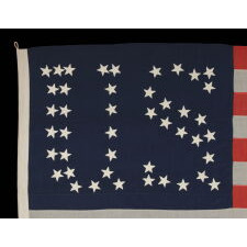 44 STARS CONFIGURED INTO THE LETTERS “U.S.”, PATENTED IN 1890 BY W.R. WASHBURN, ONE OF ONLY FOUR KNOWN SURVIVING EXAMPLES & ONE OF THE VERY BEST DESIGNS KNOWN TO EXIST ACROSS EARLY AMERICAN FLAGS OF ALL PERIODS; EXHIBITED AT THE MUSEUM OF THE AMERICAN REVOLUTION FROM JUNE – SEPTEMBER, 2021