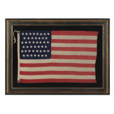 45 HAND-SEWN, SINGLE-APPLIQUED STARS ON THE SMALLEST PIECED-AND-SEWN, COMMERCIALLY-MANUFACTURED, WOOL FLAG THAT I HAVE EVER ENCOUNTERED IN THIS PERIOD, 1896-1908 (UTAH STATEHOOD), MADE AND SIGNED BY THE ANNIN COMPANY IN NEW YORK CITY