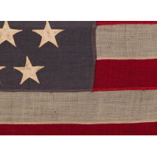 45 STAR ANTIQUE AMERICAN FLAG WITH STAGGERED ROWS OF STARS ON A DUSTY BLUE CANTON; REFLECTS THE PERIOD WHEN UTAH WAS THE MOST RECENT STATE TO JOIN THE UNION, 1896-1908