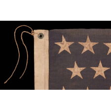 45 STAR ANTIQUE AMERICAN FLAG WITH STAGGERED ROWS OF STARS ON A DUSTY BLUE CANTON; REFLECTS THE PERIOD WHEN UTAH WAS THE MOST RECENT STATE TO JOIN THE UNION, 1896-1908